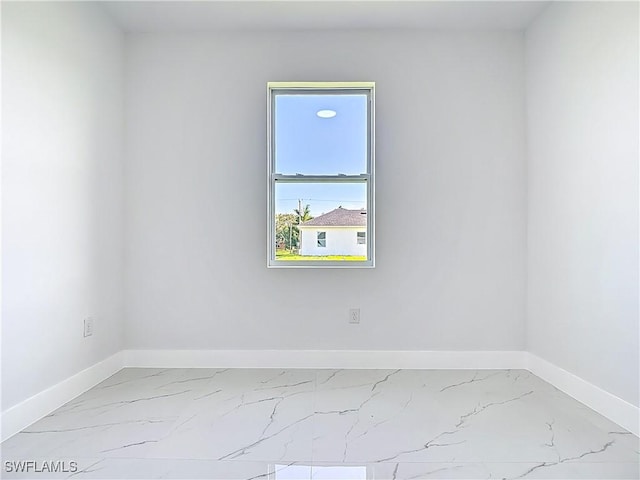 5001 Bywood St, Lehigh Acres, FL 33971 - empty room with marble finish floors