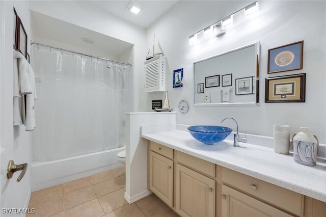 6956 Lone Oak Blvd, Naples, FL 34109 - bathroom with vanity, tile patterned flooring, and shower / bath combo with shower curtain