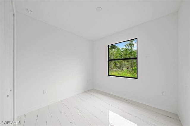 3525 43rd Ave NE, Naples, FL 34120 - spare room featuring a smoke detector