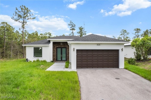 3525 43rd Ave NE, Naples, FL 34120 - view of front facade with french doors, asphalt driveway, a garage, a front lawn, and stucco siding