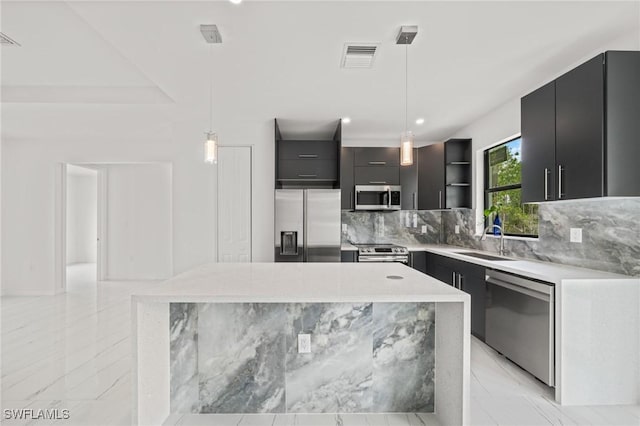 3525 43rd Ave NE, Naples, FL 34120 - kitchen with appliances with stainless steel finishes, open shelves, backsplash, light countertops, and recessed lighting