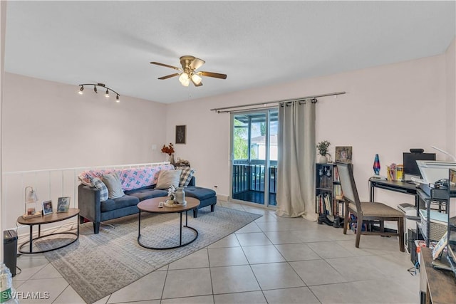 3284 Royal Canadian Trce Unit 4, Fort Myers, FL 33907 - living area with a ceiling fan and tile patterned floors