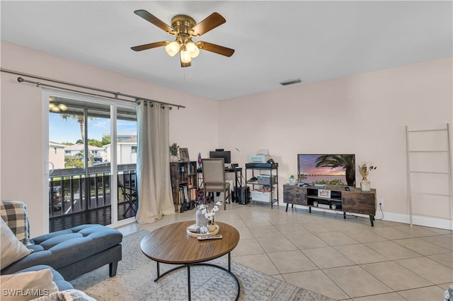 3284 Royal Canadian Trce Unit 4, Fort Myers, FL 33907 - living room featuring ceiling fan, light tile patterned floors, and an office area