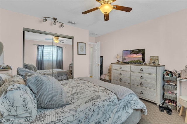 3284 Royal Canadian Trce Unit 4, Fort Myers, FL 33907 - bedroom featuring light carpet, ceiling fan, and a closet