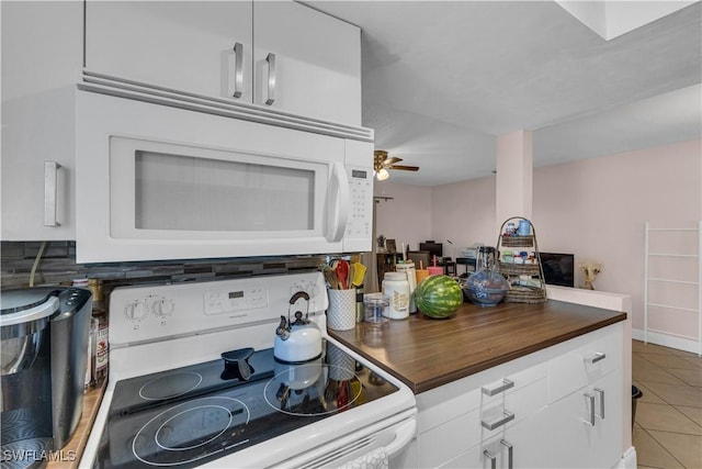 3284 Royal Canadian Trce Unit 4, Fort Myers, FL 33907 - kitchen with white appliances, light tile patterned flooring, wooden counters, white cabinets, and ceiling fan