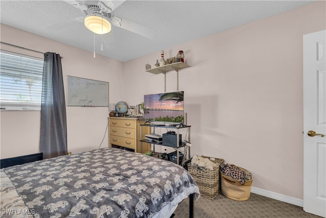 3284 Royal Canadian Trce Unit 4, Fort Myers, FL 33907 - carpeted bedroom featuring a ceiling fan and a textured ceiling