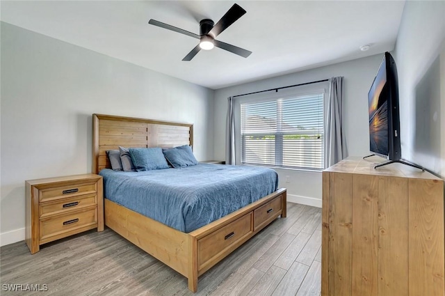 692 Hadley St E, Naples, FL 34104 - bedroom featuring light wood-style floors and ceiling fan
