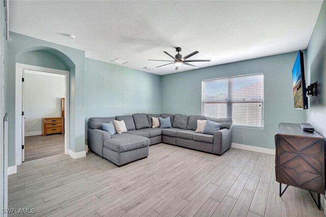 692 Hadley St E, Naples, FL 34104 - living area featuring light wood-style floors and a ceiling fan