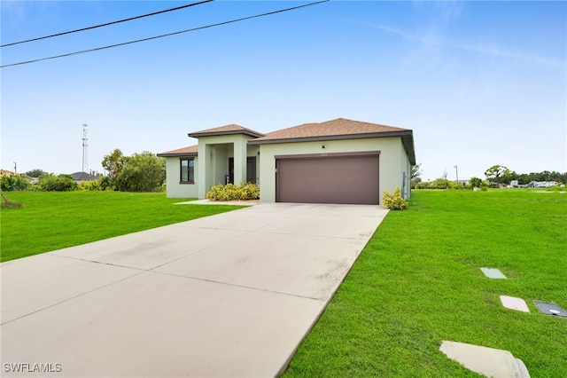 2622 SW 5th St, Cape Coral, FL 33991 - view of front of home with stucco siding, a garage, concrete driveway, and a front yard
