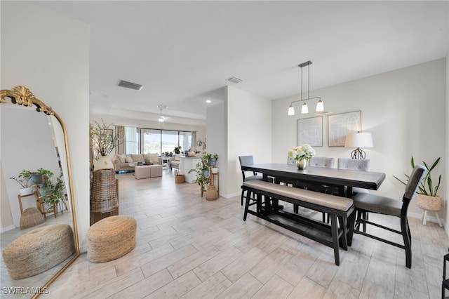 2622 SW 5th St, Cape Coral, FL 33991 - dining area with light wood-type flooring and baseboards