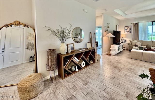 2622 SW 5th St, Cape Coral, FL 33991 - living room with wood finished floors and healthy amount of natural light