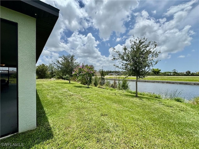 2622 SW 5th St, Cape Coral, FL 33991 - view of grassy yard with a water view