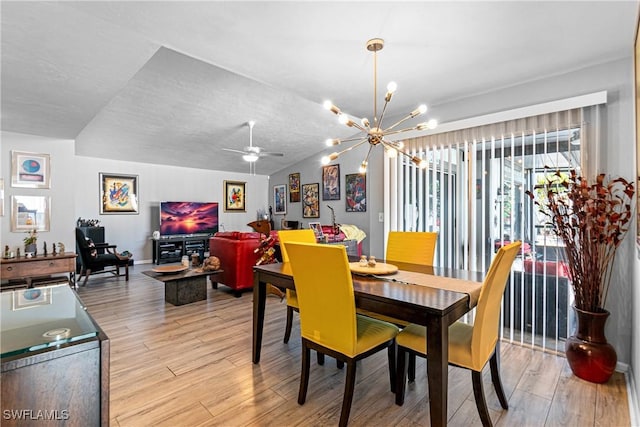 9761 Maplecrest Cir, Lehigh Acres, FL 33936 - dining area with a chandelier, light wood finished floors, and ceiling fan
