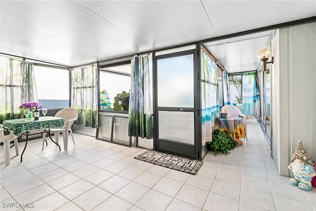 9817 Maplecrest Cir, Lehigh Acres, FL 33936 - sunroom with healthy amount of natural light