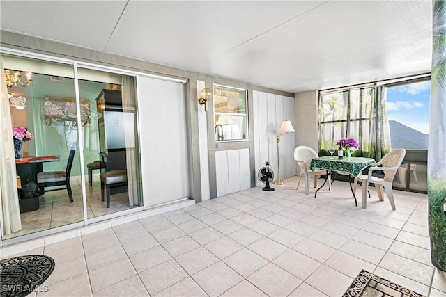 9817 Maplecrest Cir, Lehigh Acres, FL 33936 - view of sunroom / solarium