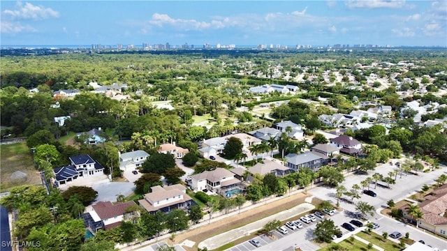 2855 Coach House Way, Naples, FL 34105 - aerial view of property and surrounding area featuring skyline