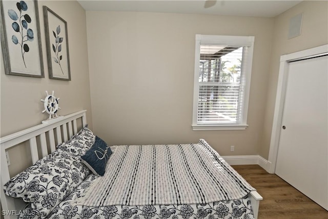 2855 Coach House Way, Naples, FL 34105 - bedroom featuring wood finished floors and baseboards