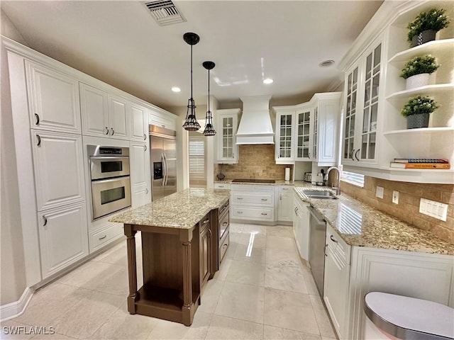2855 Coach House Way, Naples, FL 34105 - kitchen featuring custom exhaust hood, stainless steel appliances, white cabinets, and recessed lighting