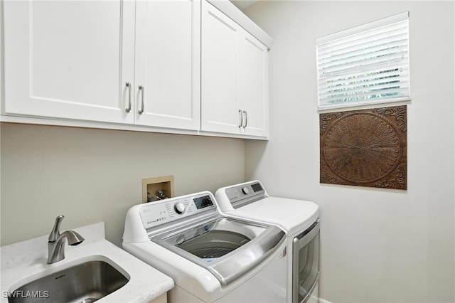 700 L Ambiance Cir Unit 202, Naples, FL 34108 - laundry area with washer and dryer and cabinet space