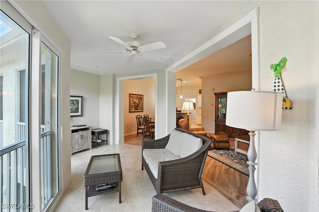 700 L Ambiance Cir Unit 202, Naples, FL 34108 - living room with ceiling fan and a textured wall