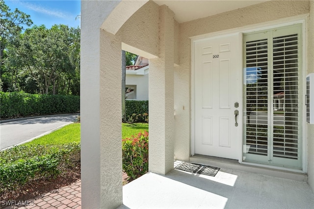 700 L Ambiance Cir Unit 202, Naples, FL 34108 - property entrance with stucco siding