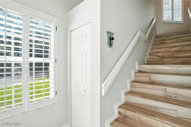 700 L Ambiance Cir Unit 202, Naples, FL 34108 - stairs featuring healthy amount of natural light
