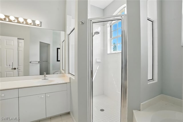 700 L Ambiance Cir Unit 202, Naples, FL 34108 - bathroom featuring a shower stall, vanity, and a bath