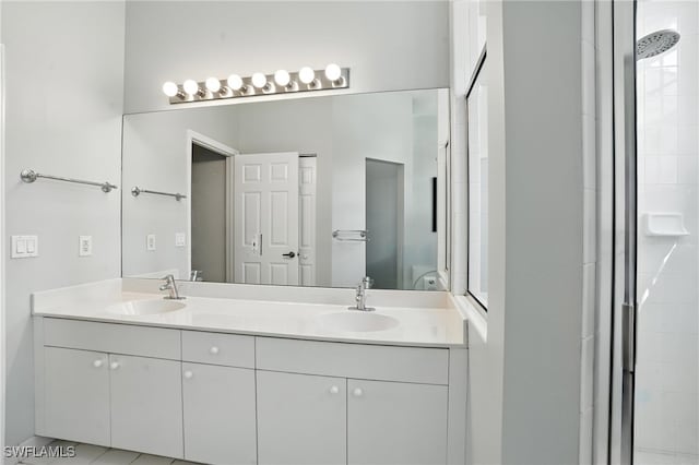 700 L Ambiance Cir Unit 202, Naples, FL 34108 - bathroom with double vanity and a tile shower