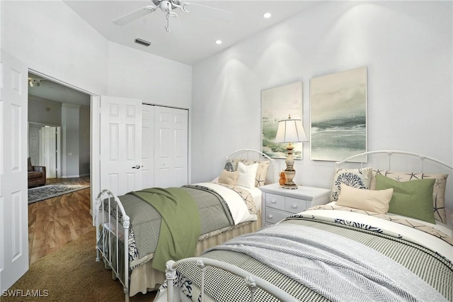 700 L Ambiance Cir Unit 202, Naples, FL 34108 - bedroom featuring a closet, wood finished floors, a ceiling fan, and recessed lighting