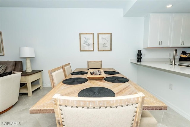 5467 Double Eagle Cir Unit 3212, Ave Maria, FL 34142 - dining space with light tile patterned floors and recessed lighting