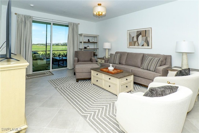 5467 Double Eagle Cir Unit 3212, Ave Maria, FL 34142 - living area featuring light tile patterned flooring