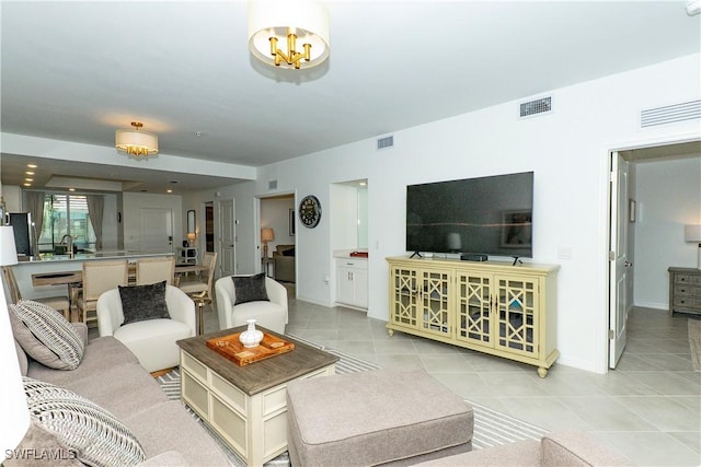 5467 Double Eagle Cir Unit 3212, Ave Maria, FL 34142 - living area featuring light tile patterned floors and baseboards
