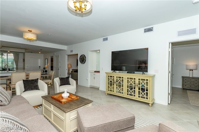 5467 Double Eagle Cir Unit 3212, Ave Maria, FL 34142 - living area with light tile patterned floors and baseboards