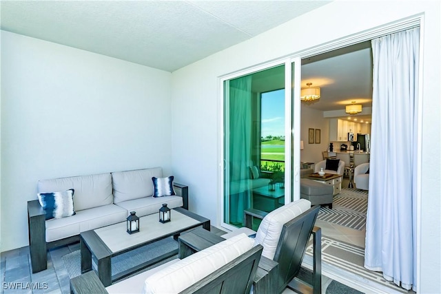 5467 Double Eagle Cir Unit 3212, Ave Maria, FL 34142 - balcony with an outdoor living space