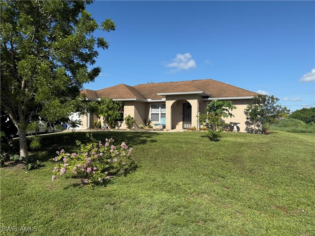 107 Indiana Pl, Lehigh Acres, FL 33936 - photo 1