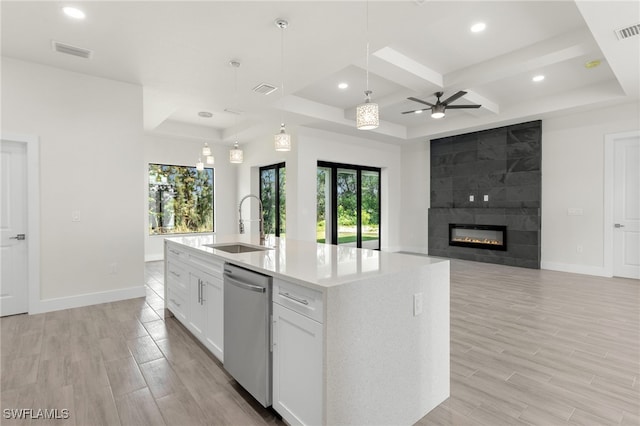 1159 SW 5th Ter, Cape Coral, FL 33991 - kitchen featuring dishwasher, light wood-style flooring, coffered ceiling, ceiling fan, and white cabinets