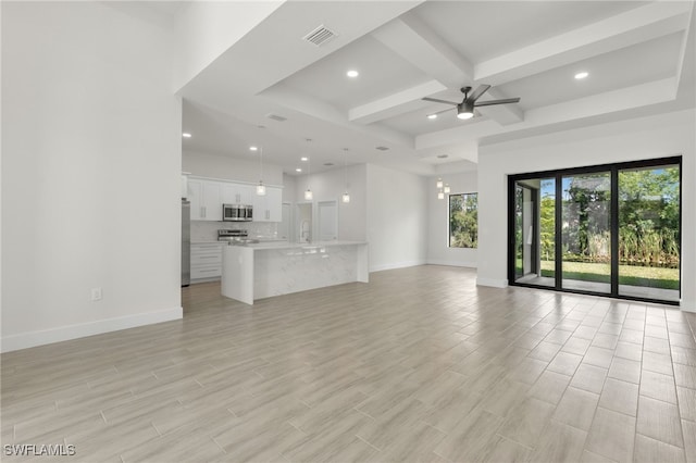 1159 SW 5th Ter, Cape Coral, FL 33991 - unfurnished living room with coffered ceiling, beam ceiling, ceiling fan, recessed lighting, and light wood-type flooring