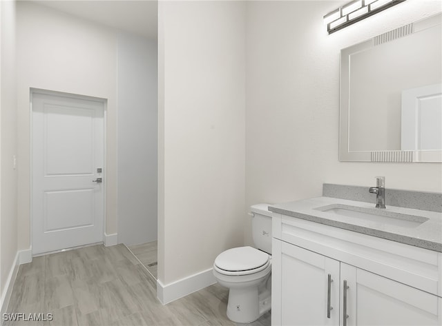 1159 SW 5th Ter, Cape Coral, FL 33991 - bathroom featuring vanity and toilet