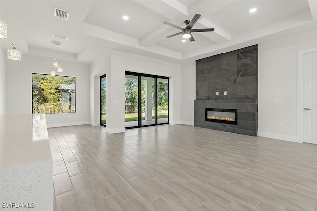 1159 SW 5th Ter, Cape Coral, FL 33991 - unfurnished living room with healthy amount of natural light, ceiling fan, recessed lighting, coffered ceiling, and beamed ceiling