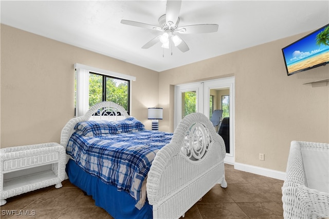 27780 Matheson Ave, Bonita Springs, FL 34135 - bedroom featuring multiple windows, tile patterned floors, ceiling fan, and french doors