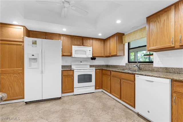 27780 Matheson Ave, Bonita Springs, FL 34135 - kitchen featuring white appliances, a ceiling fan, brown cabinetry, recessed lighting, and dark stone counters