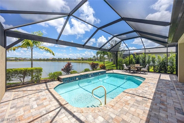 7773 Jacaranda Ln, Naples, FL 34114 - outdoor pool with a water view, a patio, and a lanai