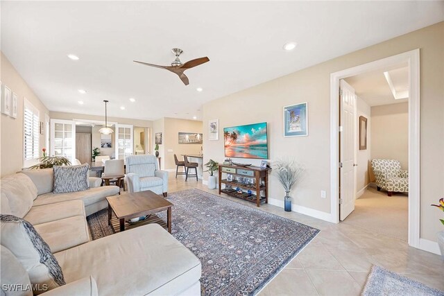 7773 Jacaranda Ln, Naples, FL 34114 - living room featuring a ceiling fan, light tile patterned floors, and recessed lighting
