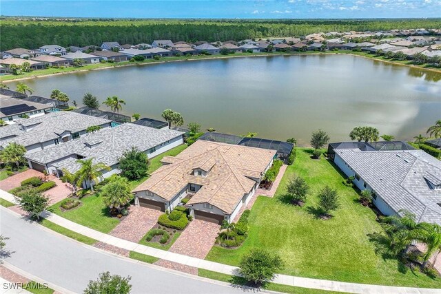 7773 Jacaranda Ln, Naples, FL 34114 - aerial view of residential area featuring a large body of water