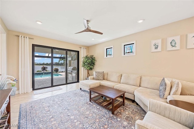 7773 Jacaranda Ln, Naples, FL 34114 - tiled living room with recessed lighting and a ceiling fan