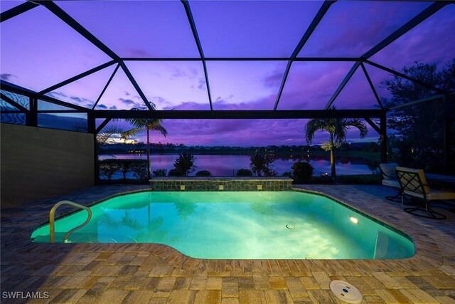 7773 Jacaranda Ln, Naples, FL 34114 - swimming pool featuring a patio and a lanai