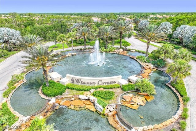 7773 Jacaranda Ln, Naples, FL 34114 - bird's eye view of a garden pond