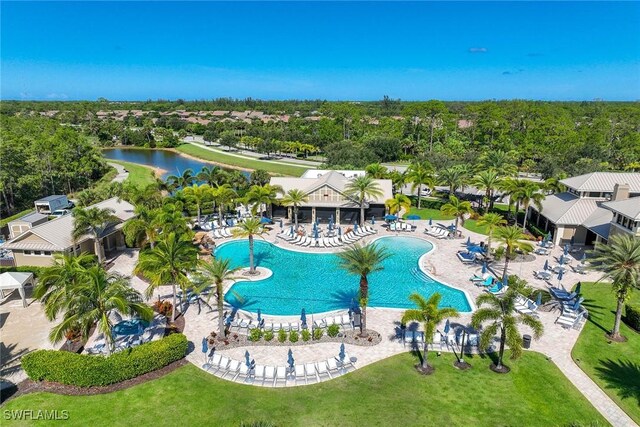 7773 Jacaranda Ln, Naples, FL 34114 - community pool with a water view and a residential view