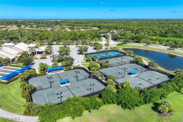 7773 Jacaranda Ln, Naples, FL 34114 - bird's eye view of a heavily wooded area and a nearby body of water