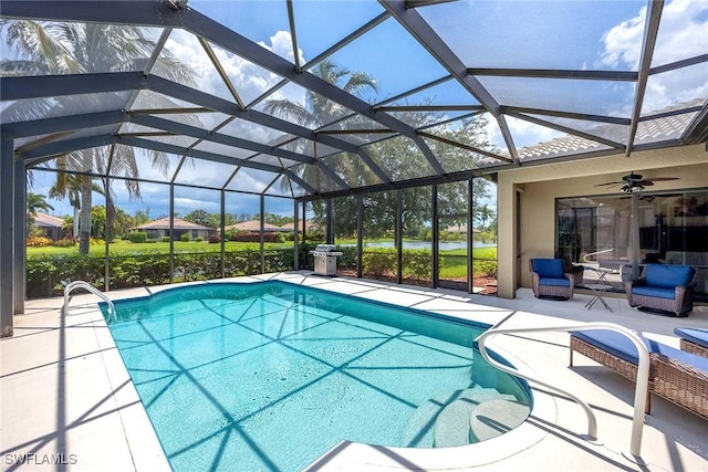 3820 Ruby Way, Naples, FL 34114 - swimming pool with a patio area, ceiling fan, and glass enclosure